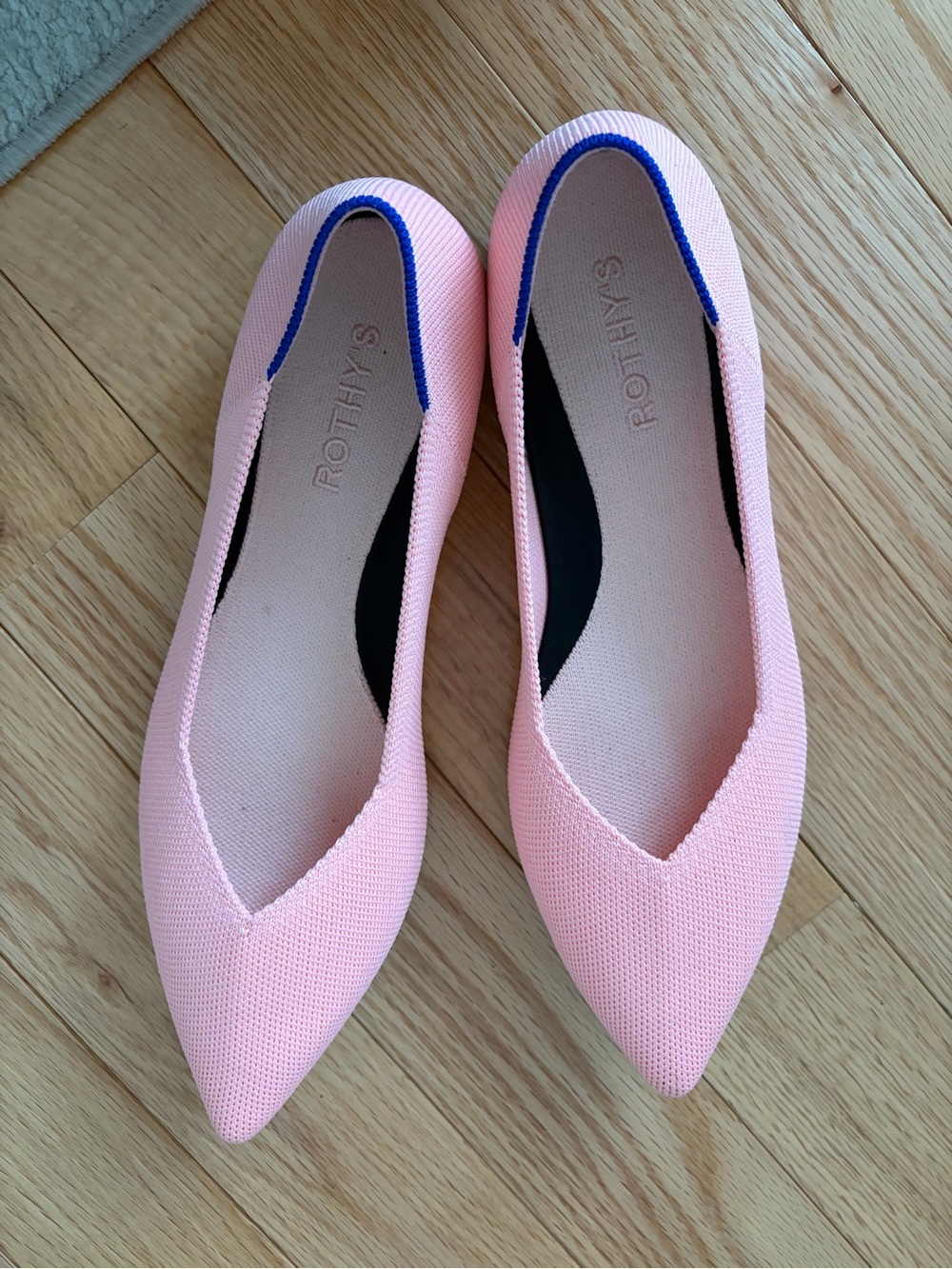 Rothy's Pointed Ballet Flat in Light Pink with Blue Trim
